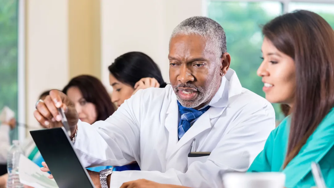 Physicians learning in a classroom.
