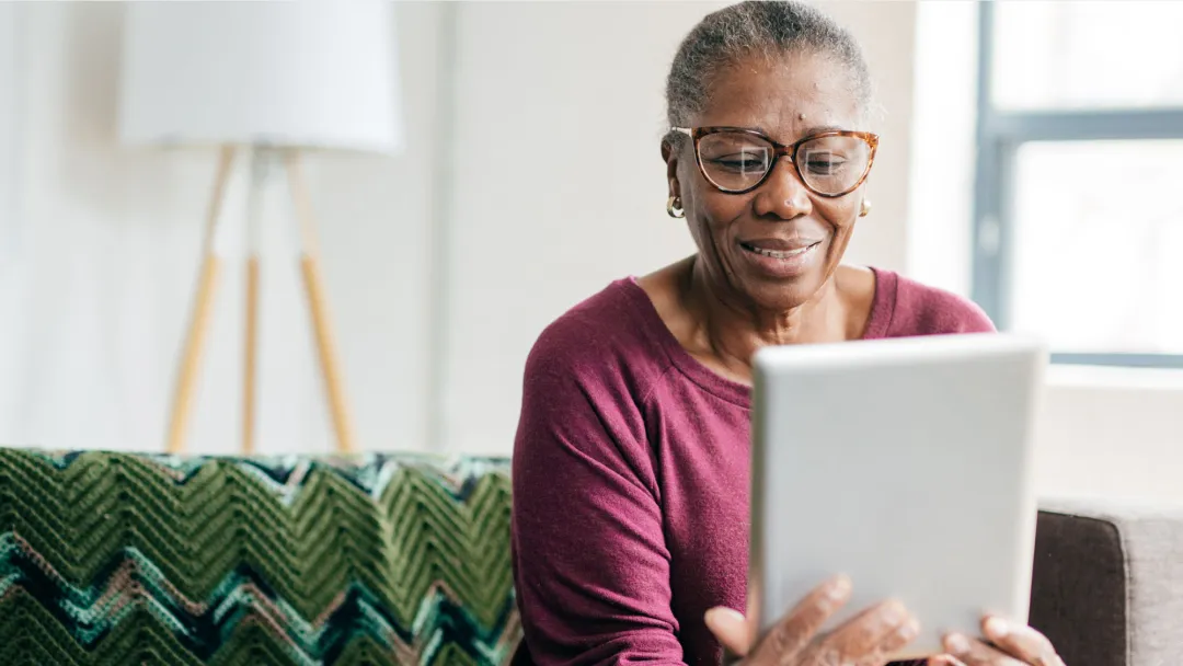 Woman reading tablet