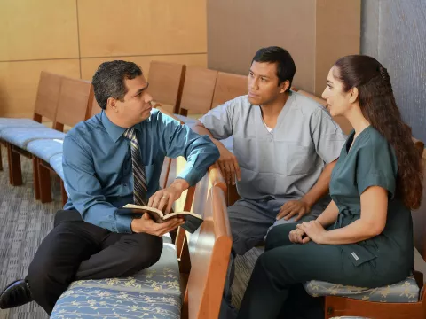 A group of people studying the bible