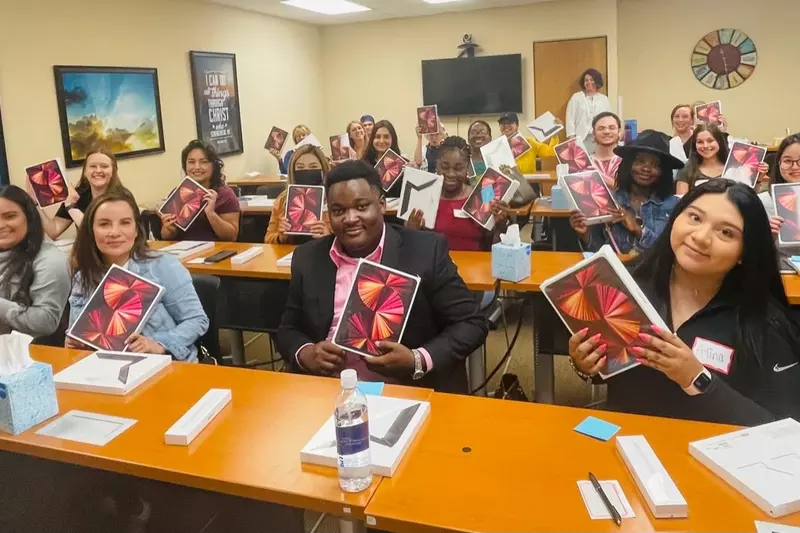 AHU Denver nursing students receive their iPads in May 2022.